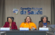 São 3 mulheres sentadas à mesa de debate do Conselho Nacional de Saúde